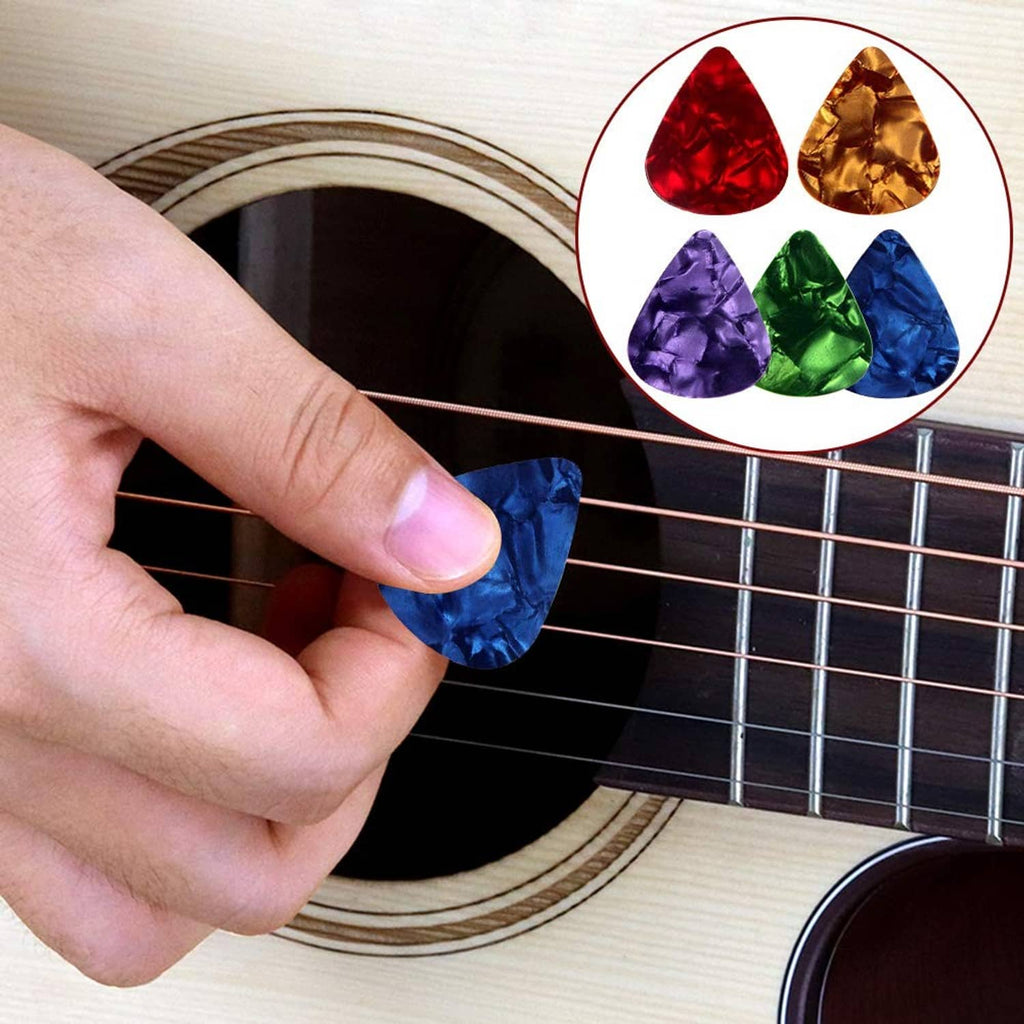 Silicone guitar finger guard on finger for chord playing on an acoustic guitar