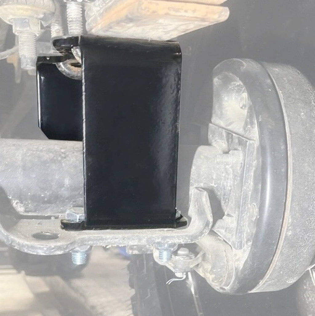 Installed black lift bracket on rear axle assembly with fasteners and wiring