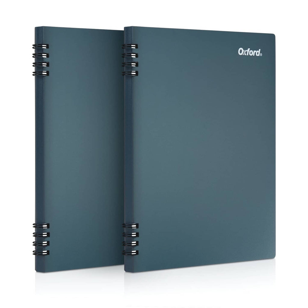 Teal spiral-bound notebook, open view with smooth dark cover