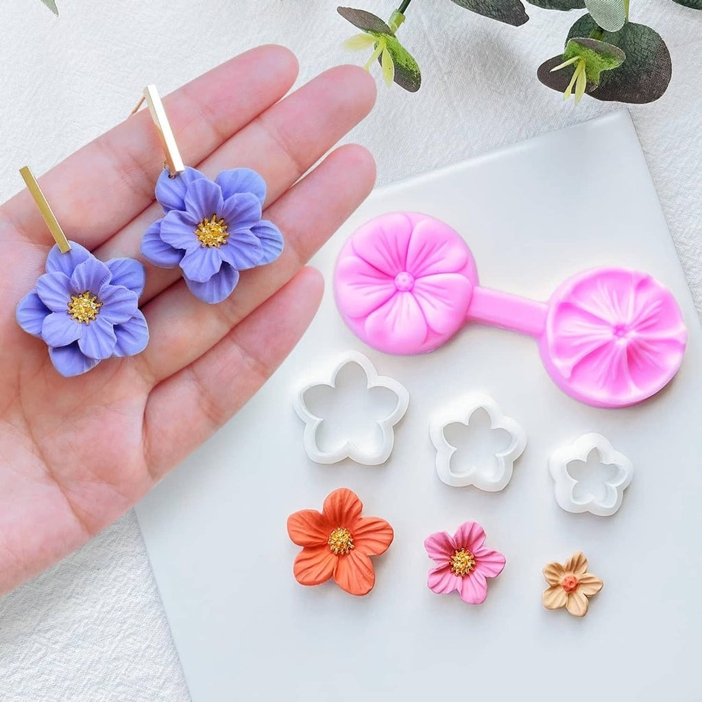 Flower petal clay cutters with blue and pink flower earrings plus white flower molds