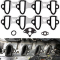 Intake manifold gasket set with multiple black-edged gasket seals and metal backing pieces