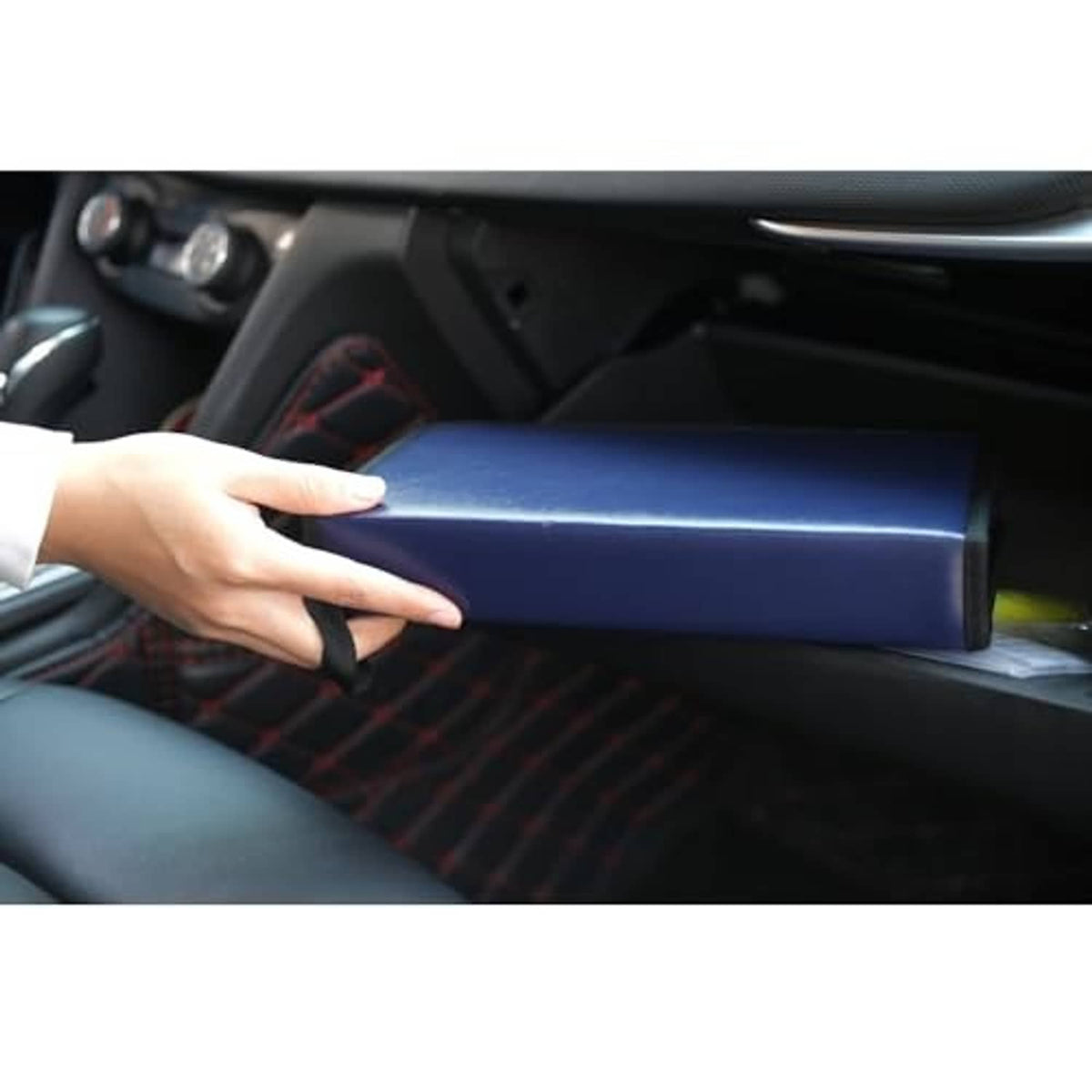 Blue PU leather CD/DVD case with zipper being placed in car seat pocket