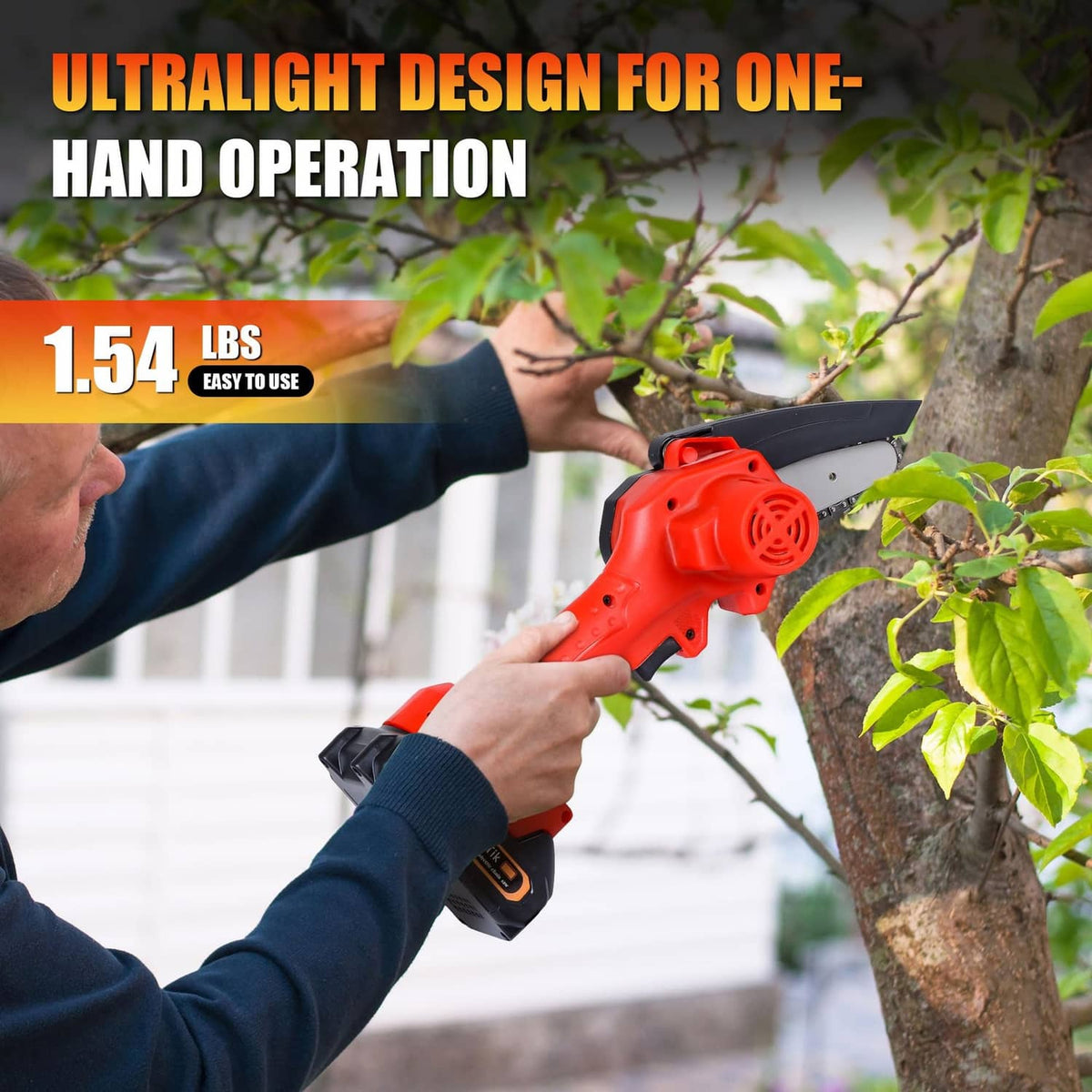 Ultralight one-hand mini cordless chainsaw with red body held near a tree branch