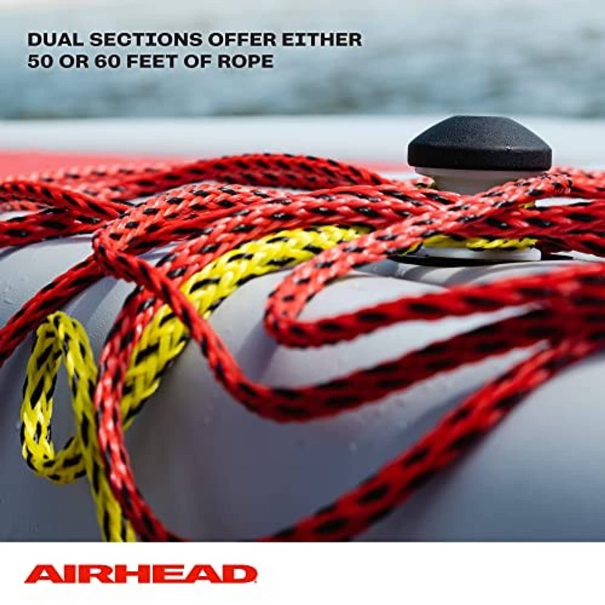 Braided tow rope attached to a tow tube, red and yellow rope with protective stopper
