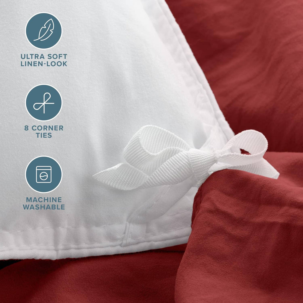 White corner ties and linen-look seam on red duvet cover corner