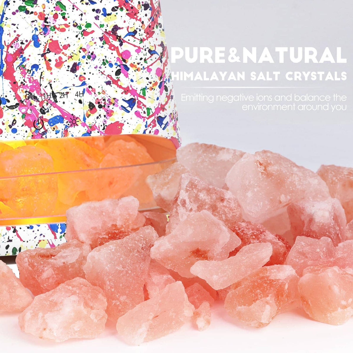 Colorful salt lamp base with orange glow and visible pile of pink Himalayan salt crystals