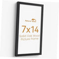 Black solid oak 7x14 picture frame with clear glass front and simple border