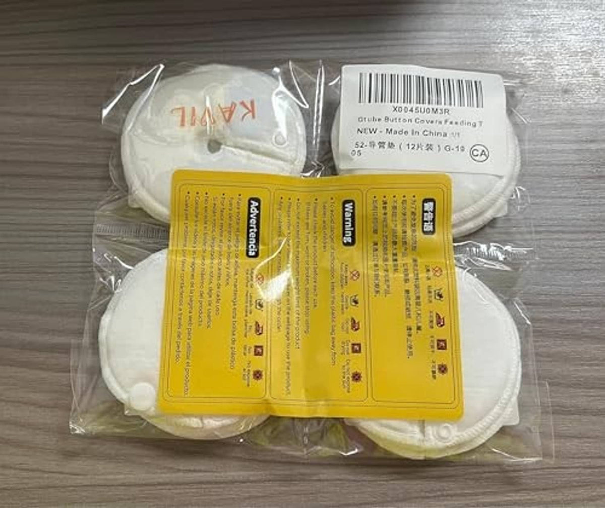 Sealed bag containing white button cover pads with barcode label visible
