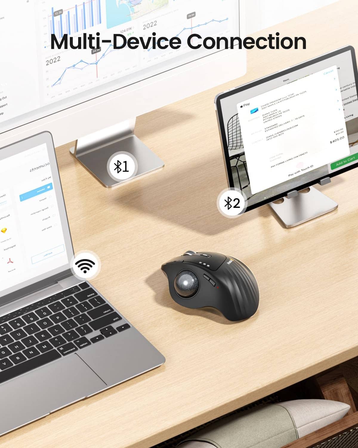 Wireless multi-device trackball mouse on desk with trackball and side control buttons