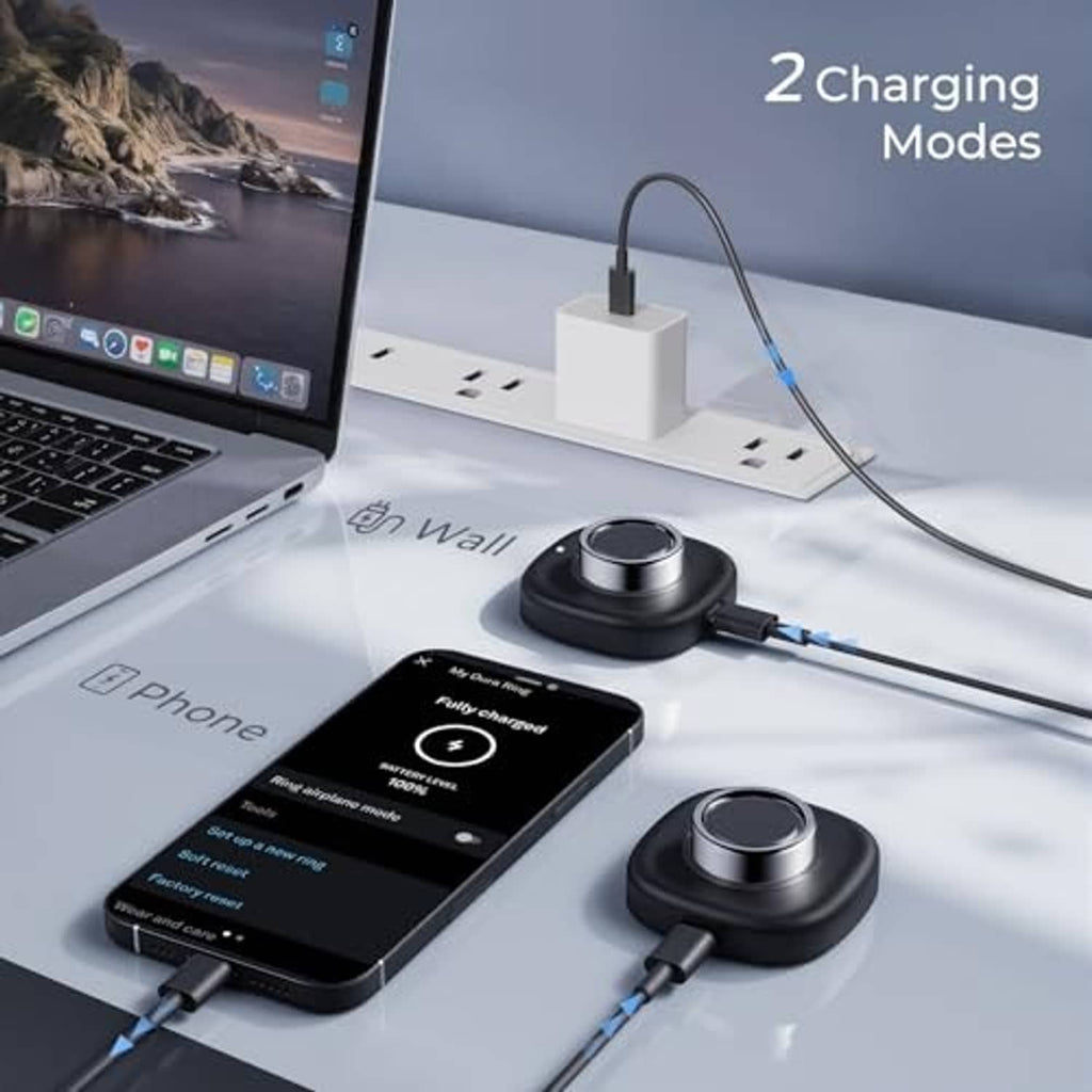 Magnetic ring charger puck connected to laptop power and phone charging setup