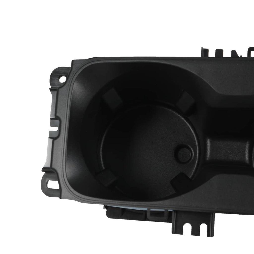 Black circular cup holder recess with molded grips