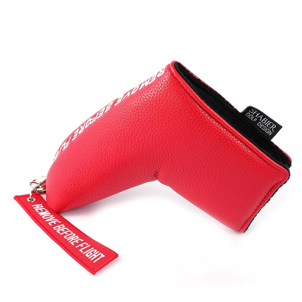 Red blade putter cover with "Remove Before Flight" text and keyring strap