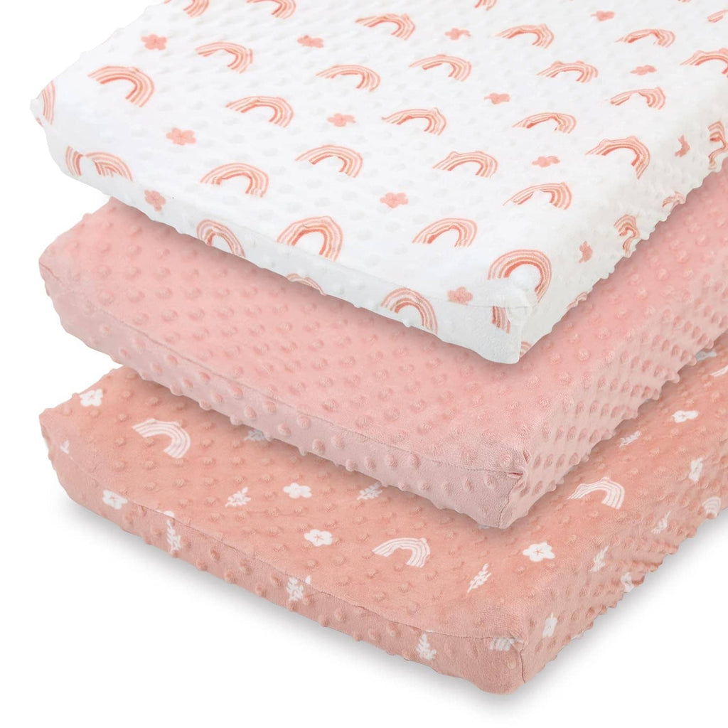 Pink minky changing pad cover with rainbow and cloud print, scalloped edge