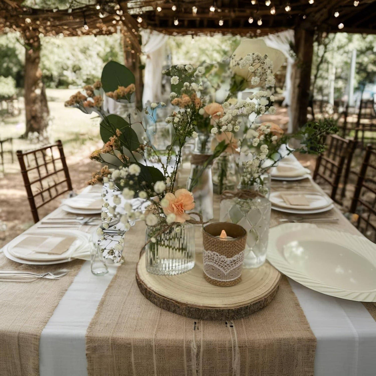 Round wood slices used as table decor base with floral centerpieces