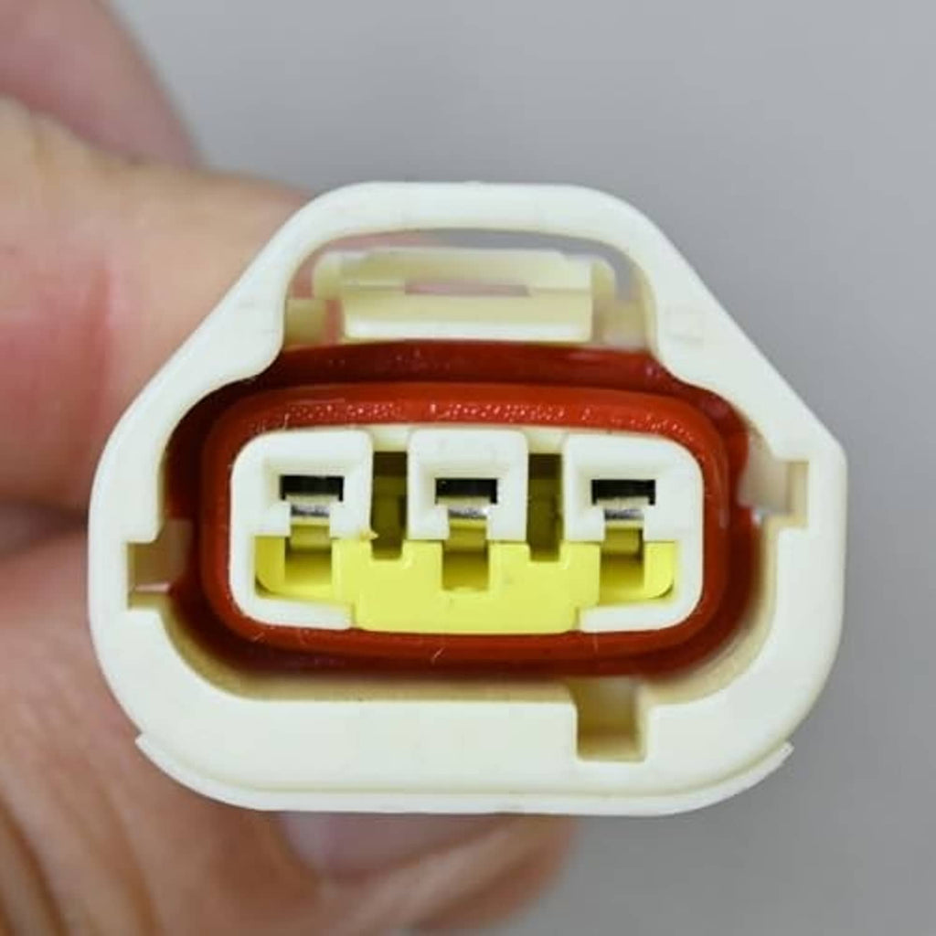 TPS throttle position sensor connector plug, close-up of multi-pin interior and wiring tabs