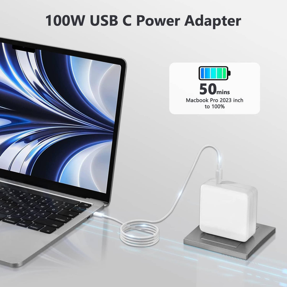 White 100W USB-C power adapter with cable connected to a charging setup