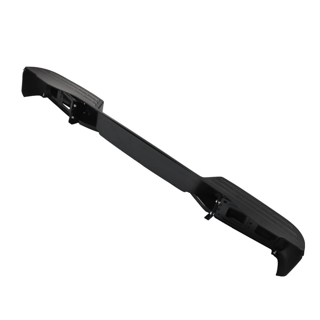 Angled view of black rear step bumper cover underside with mounting brackets