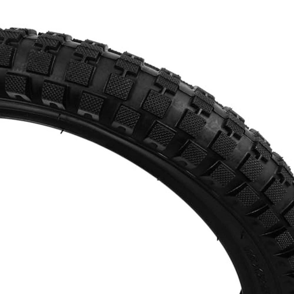 Close-up of black 16 x 2.4 bike tire tread and sidewall texture