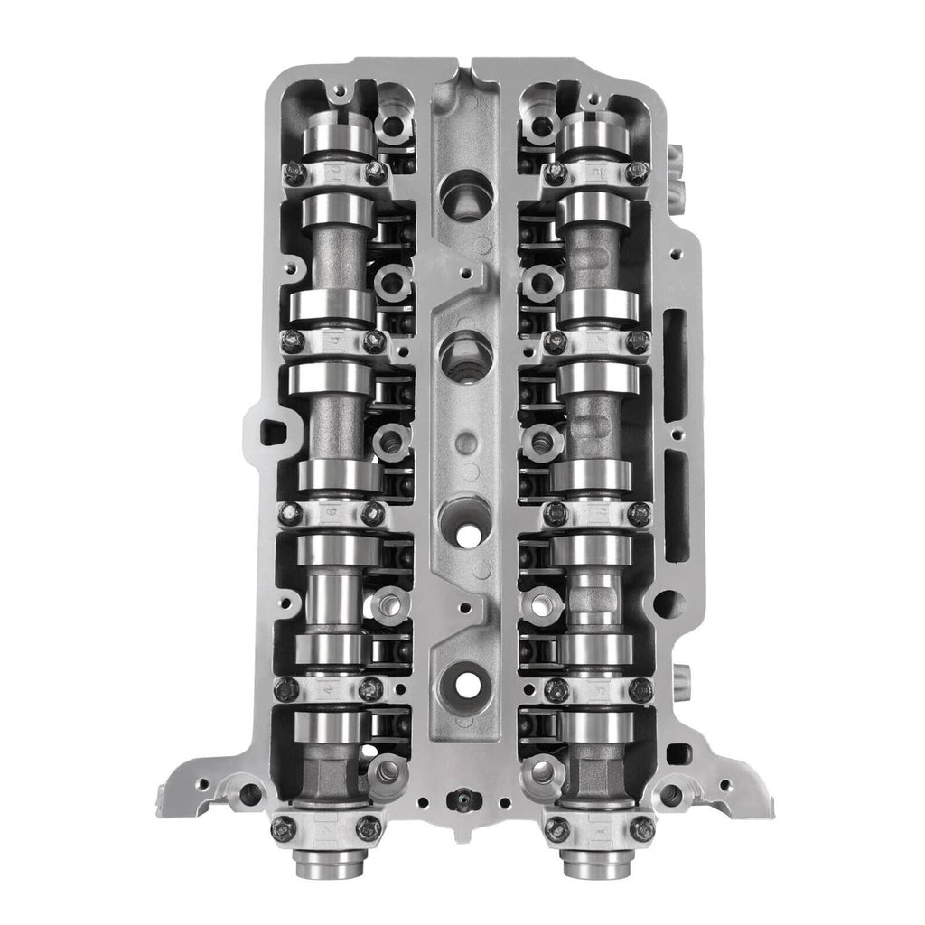 Cylinder head front view with twin camshafts and valve lifters, silver housing