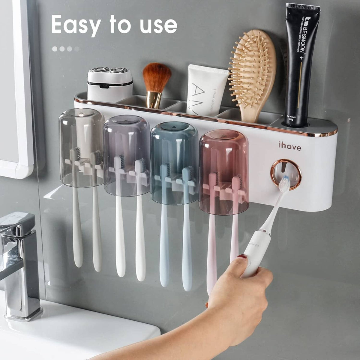 Bathroom toothbrush holder organizer with four cups and toothbrush handles shown