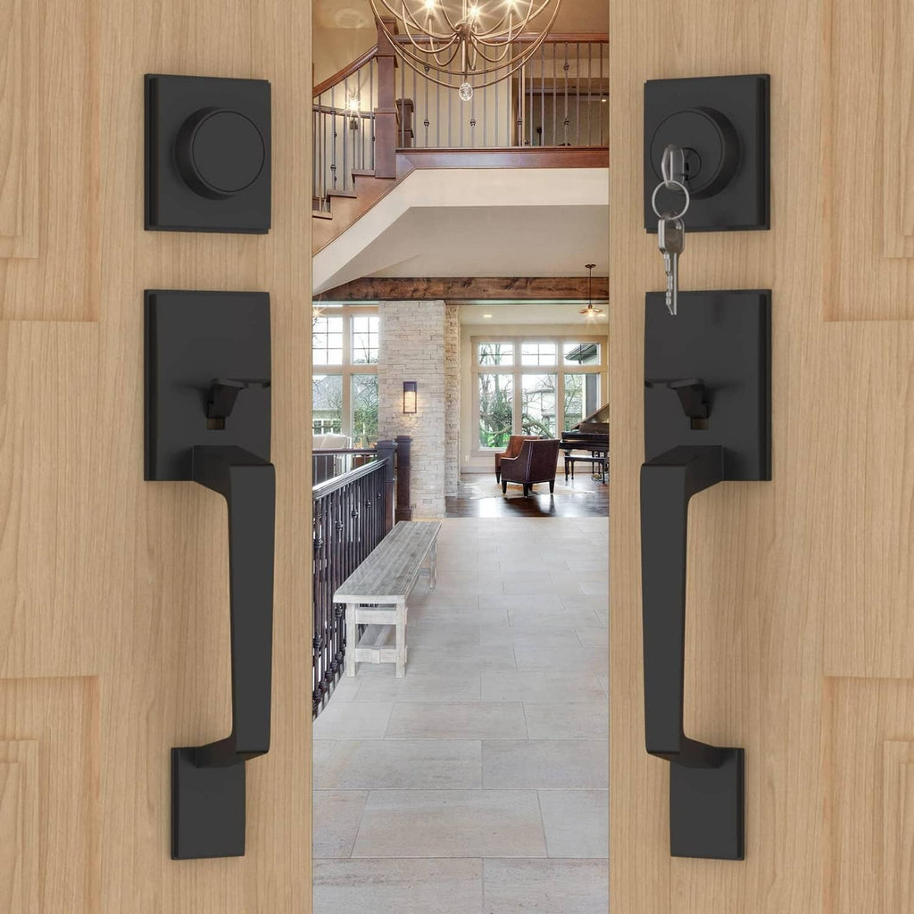Black double-front door lock set with long lever handles and round thumb-turn