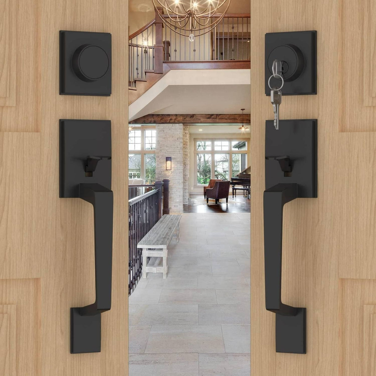 Black double-front door lock set with long lever handles and round thumb-turn