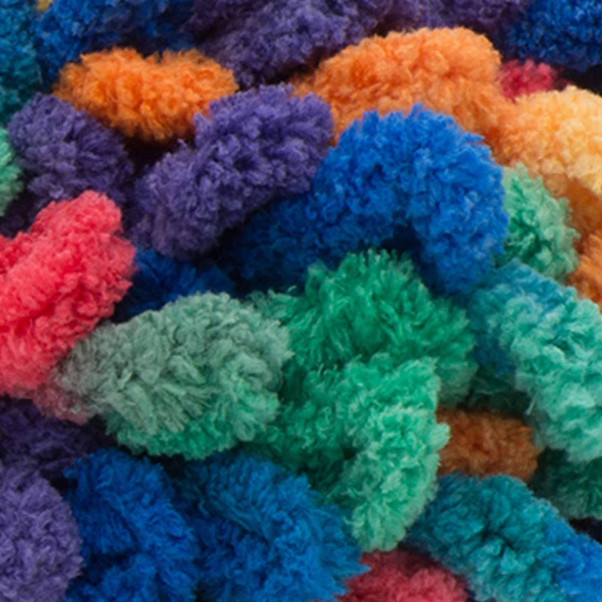 Multicolor fuzzy yarn with bright rainbow loops, close-up texture
