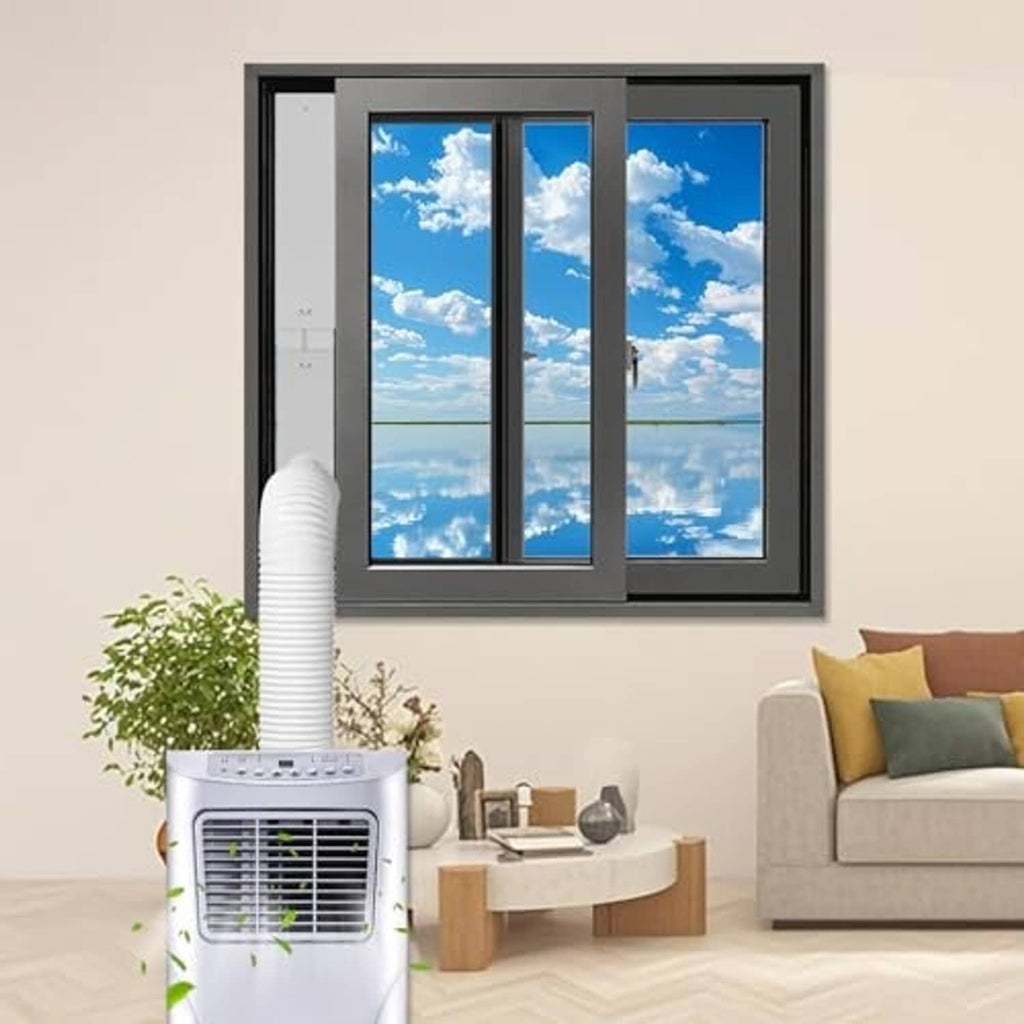Portable air conditioner with window vent hose and round-mount adapter installed near window