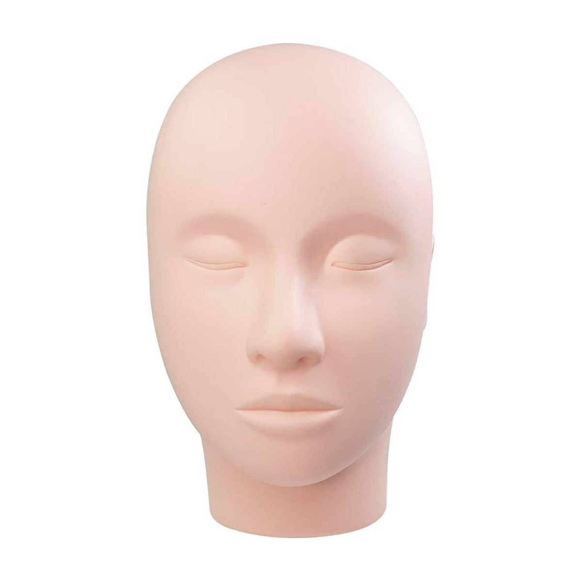 Beige lash training mannequin head with closed eyes and neutral makeup face