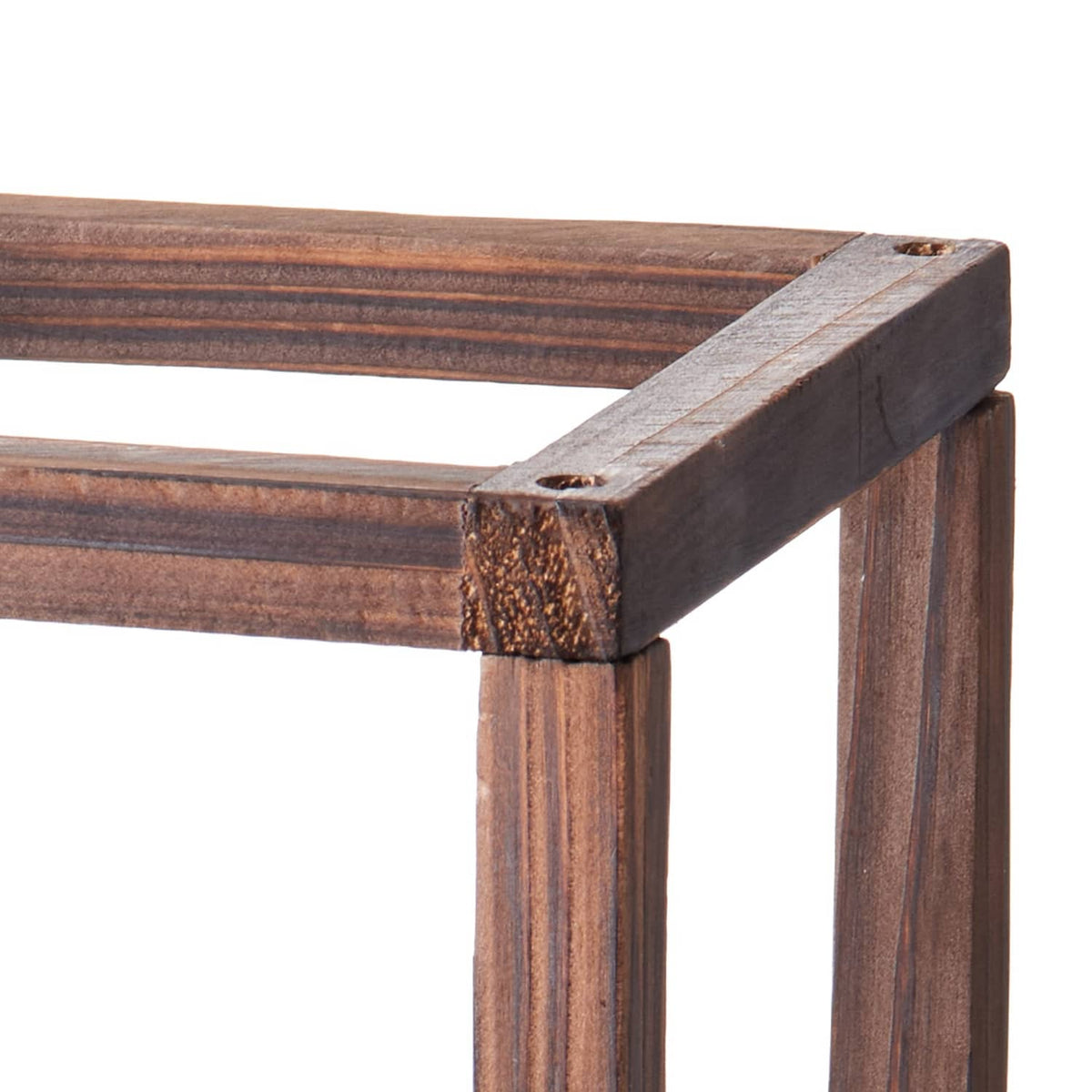 Brown wooden lantern frame with open top and angled corner join, rustic slatted sides