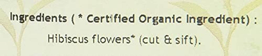 Close-up of hibiscus flowers cut & sift ingredient label on tea pouch