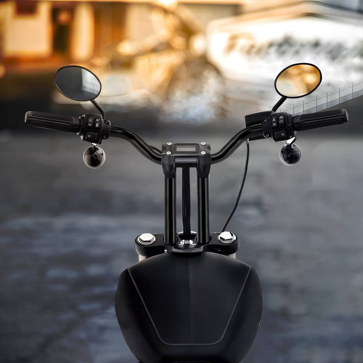 Black motorcycle T-bar handlebar with mirrors, control cluster, and center stem