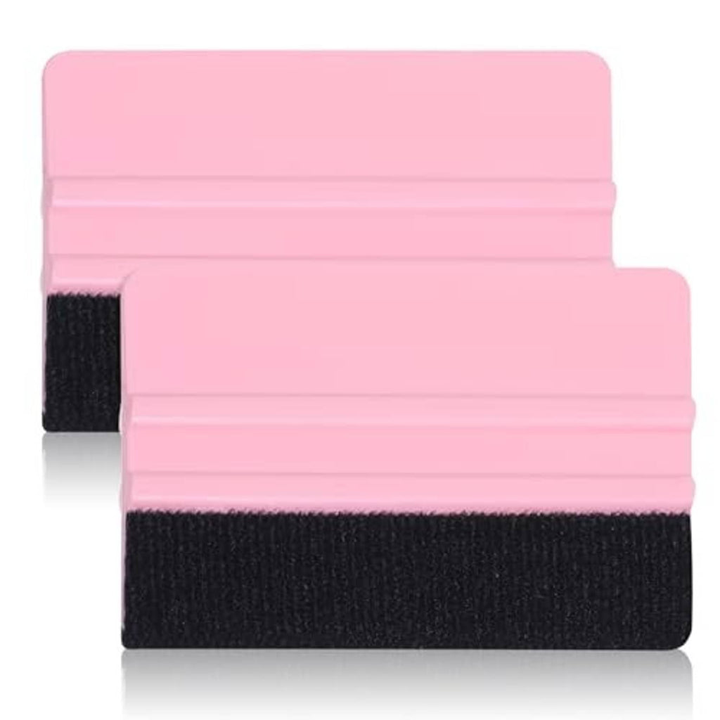 Two pink squeegee tools with black felt edges for vinyl smoothing