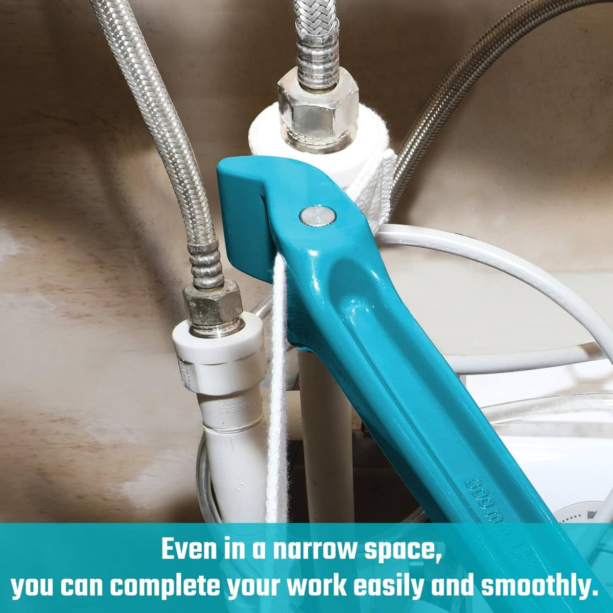 Blue strap wrench in tight space gripping plumbing pipes with woven nylon strap.