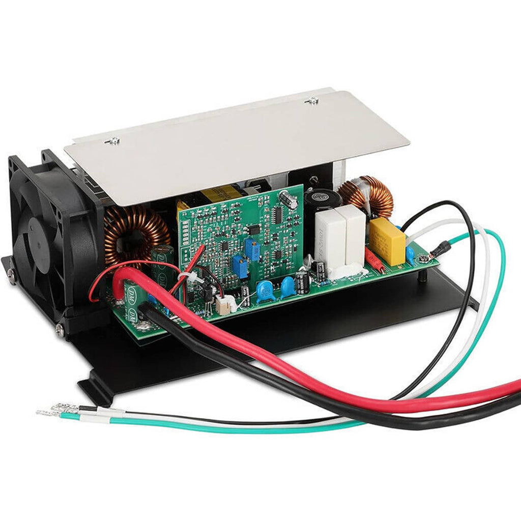 RV power converter with green PCB, dual copper coils, and connected red and green wires.