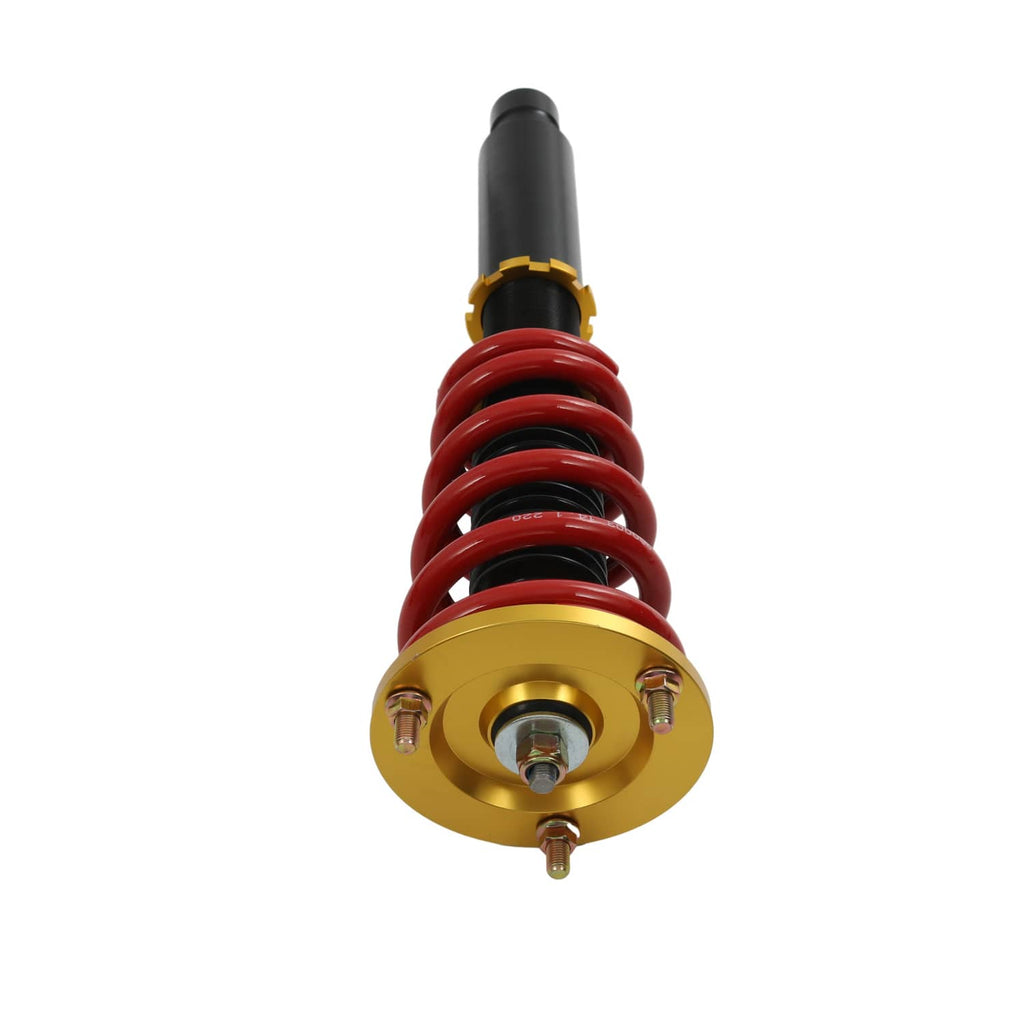Coilover shock top assembly with gold mount plate and red coil spring