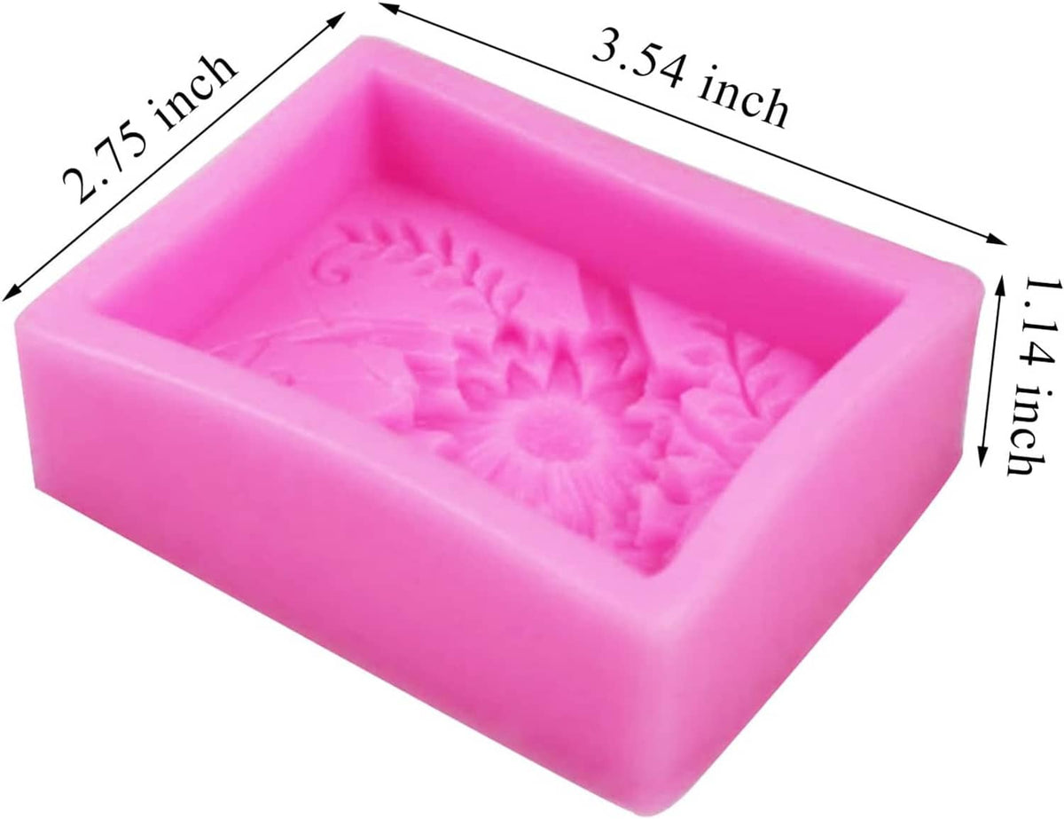 Pink silicone soap mold with 3D floral butterfly relief, single square cavity