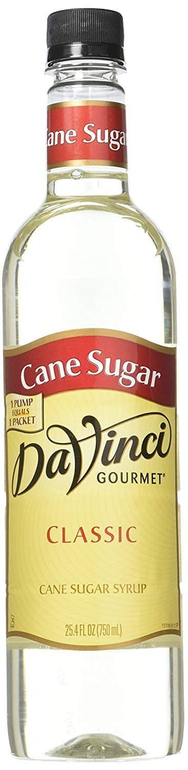 Cane sugar syrup bottle with DaVinci Classic label, glass, amber-brown syrup.