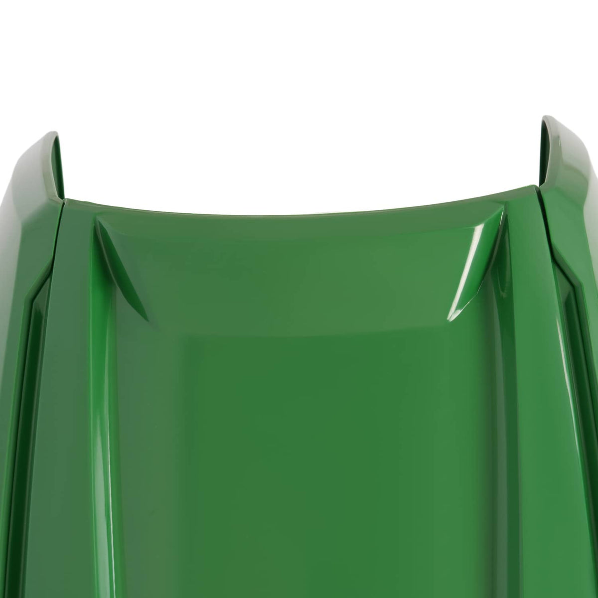 Upper hood trim panel on green lawn tractor with black side edges