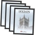Set of four black 18x24 poster frames in solid wood, stacked for display