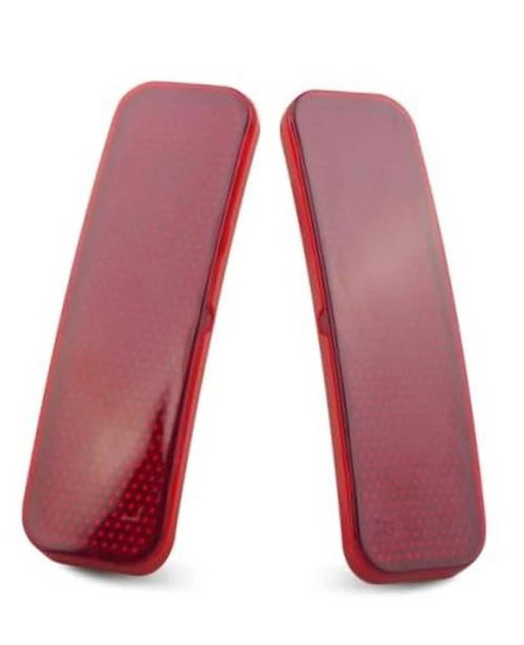 Pair of red rear bumper reflector tail lights with curved rectangular dotted lenses