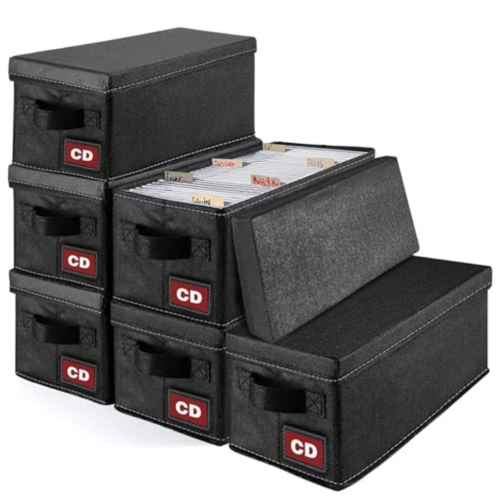 Stack of black fabric CD storage cases with hinged lid and front label windows
