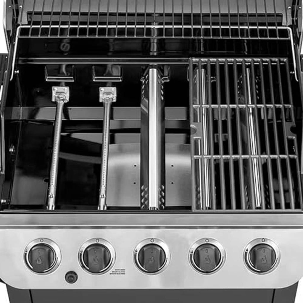 Stainless steel burner components mounted inside an outdoor grill firebox
