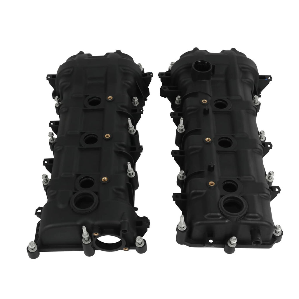 Black valve cover set, two covers side-by-side with port openings and bolt heads visible.