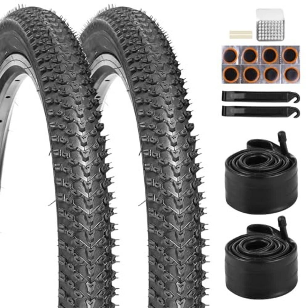Bicycle tire and tube set showing two black tires with inner tubes and installation tools