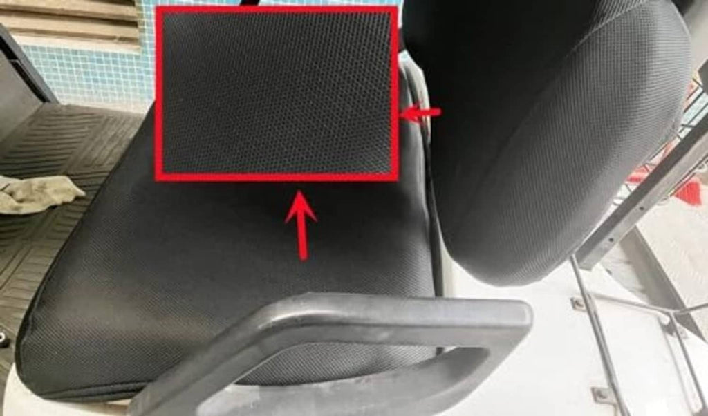 Black mesh seat cover installed on a golf cart seat with matching backrest.