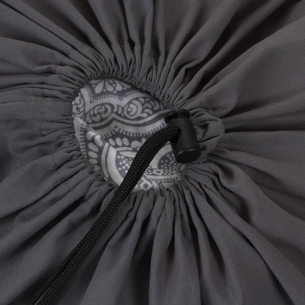 Grey cotton drawstring cinch top with black cord and printed fabric insert
