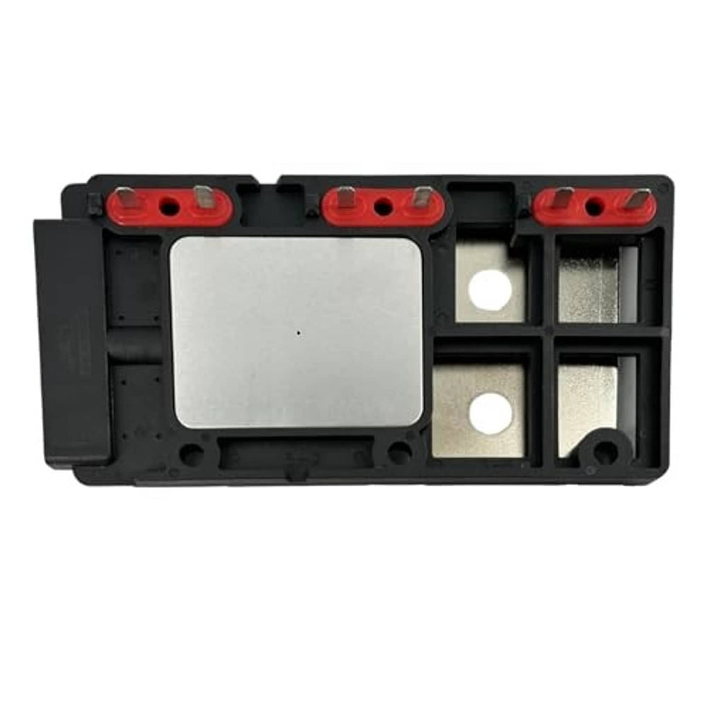 Black ignition control module with red terminal caps and exposed mounting compartments