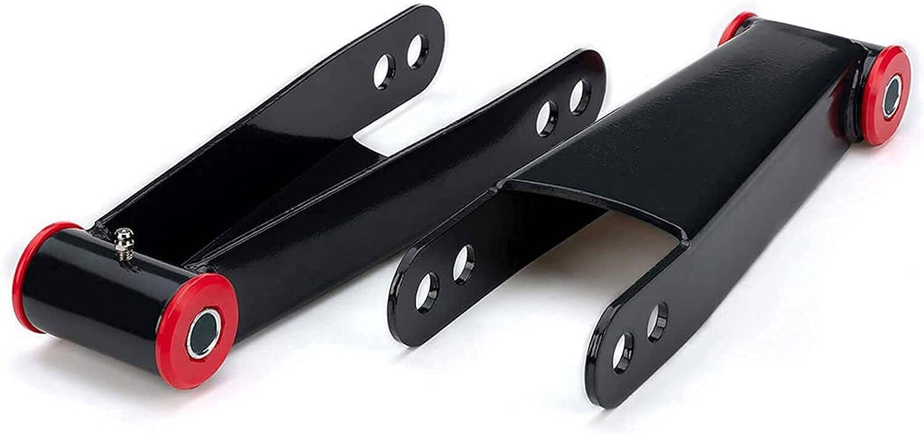 Black rear drop shackle set with red bushing ends and oval mounting holes, angled view.