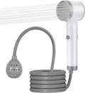 Portable rechargeable shower pump with handheld head, coiled silicone hose, and nozzle